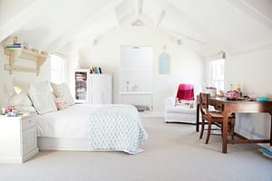 Bedroom in a loft conversion in Smalley