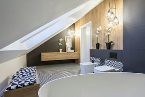 Modernly designed attic bathroom in New Cross